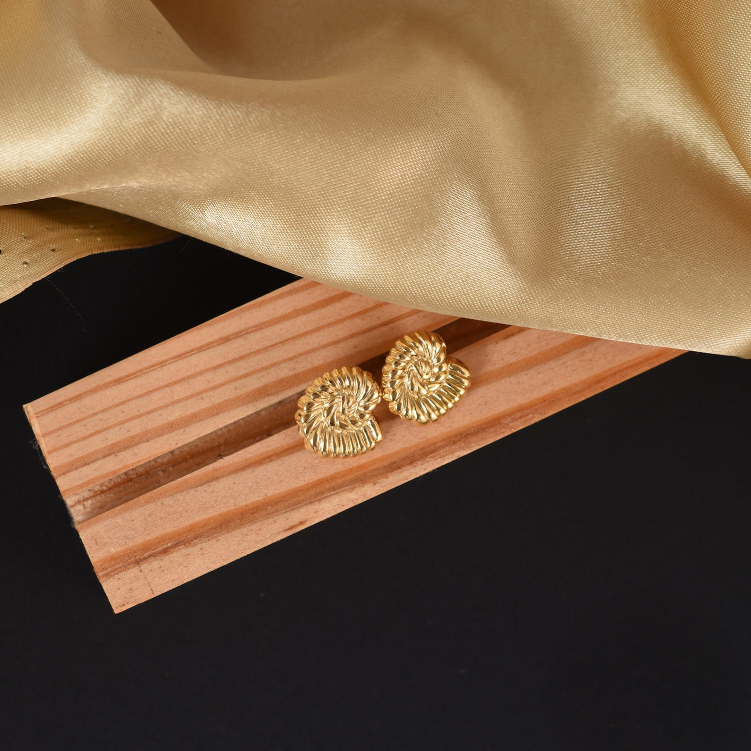 Lucy Twist Gold Stud Earrings
