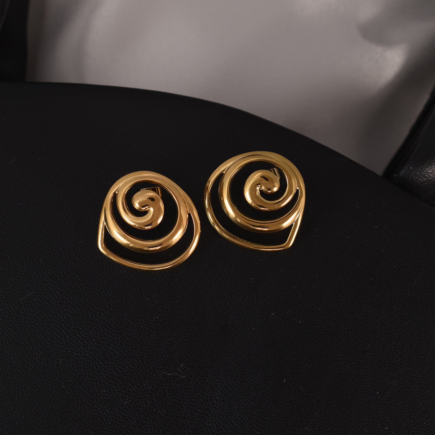 Rora Golden Swirl Stud Earrings